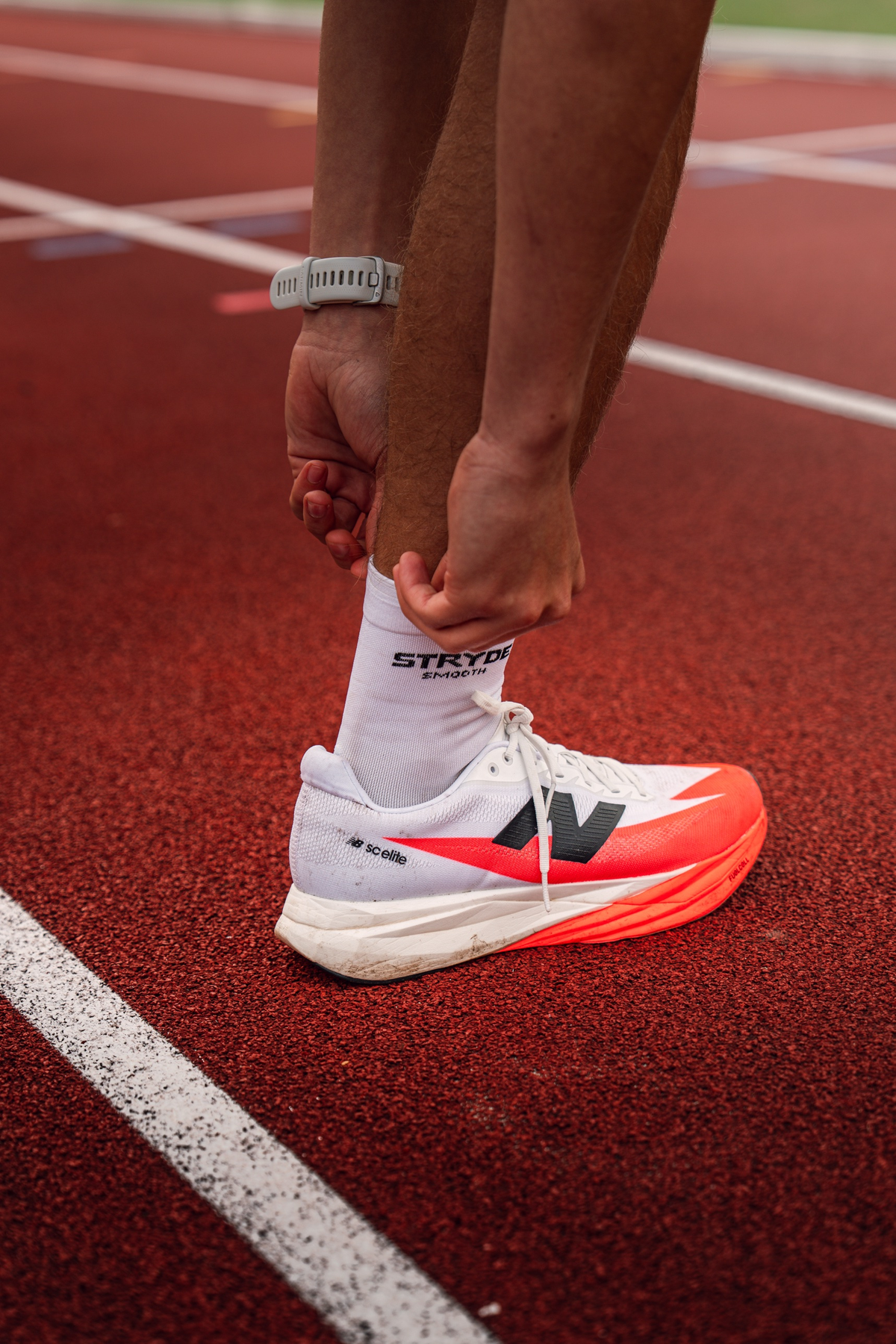 STRYDE SMOOTH white anti-blister running socks worn on a run
